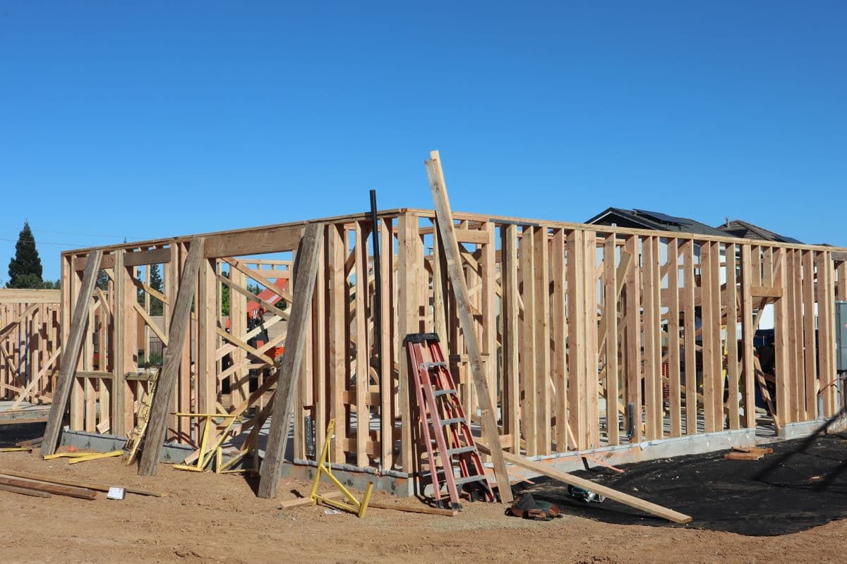 A timber-framed building under construction