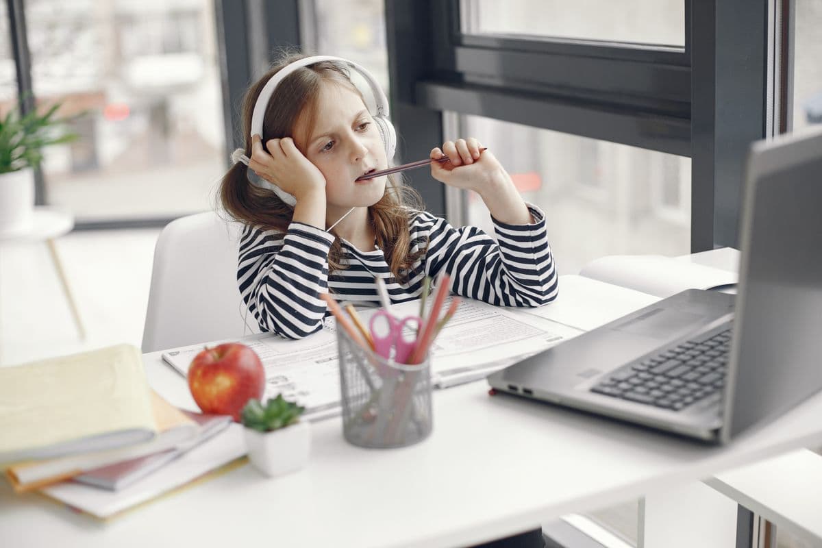 An online-learning student at a laptop