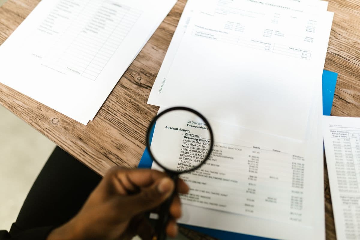 A magnifying glass over documents