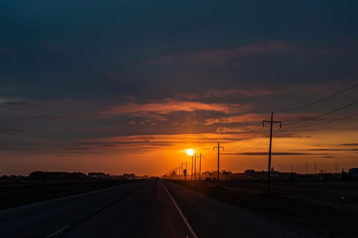 An open road at sunrise